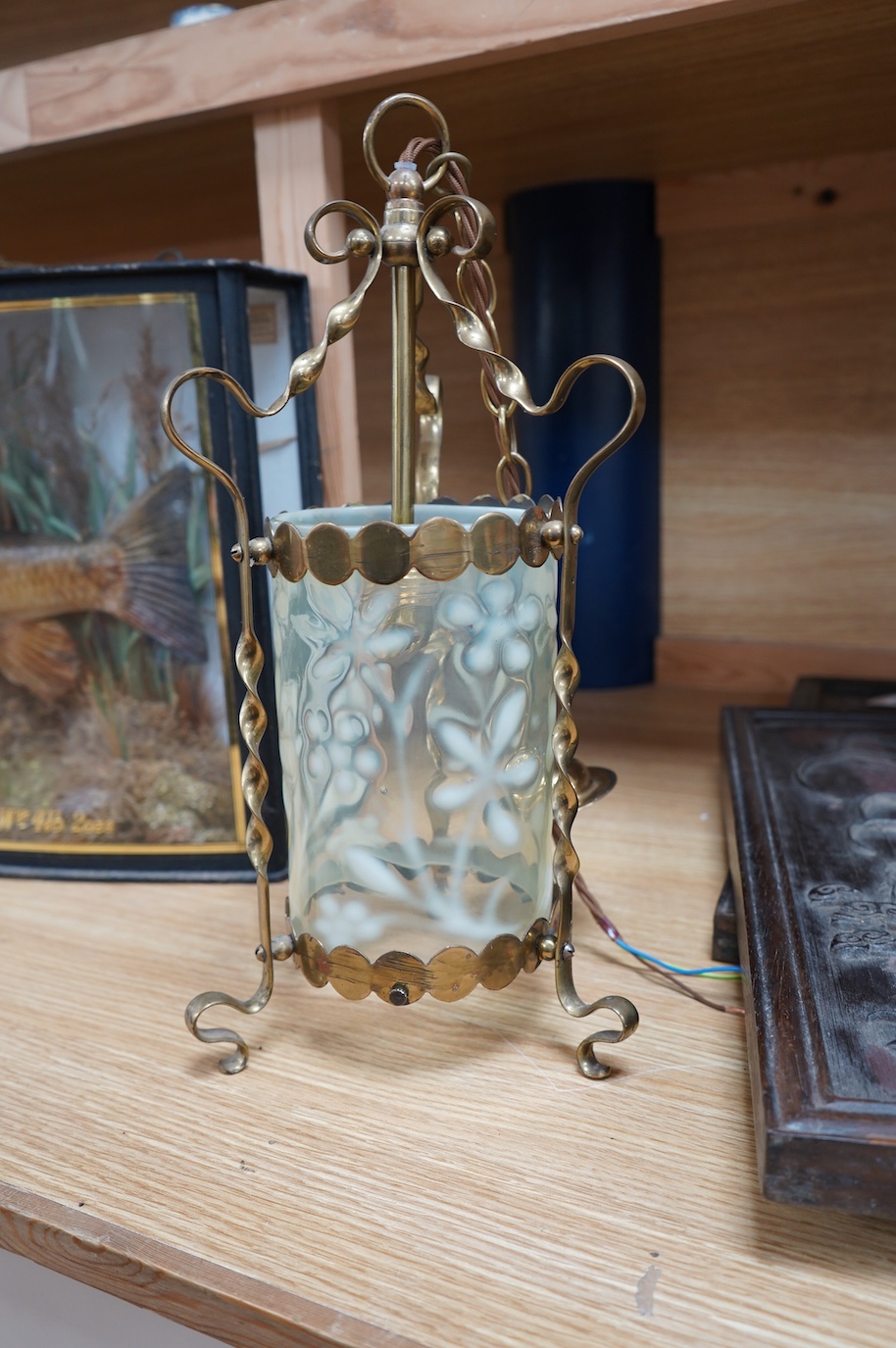 An English Arts and Crafts brass lantern with Vaseline cylinder shade decorated with flowers, including chain and ceiling rose, c.1900-1920's, wired, lantern 37cm high, shade 18cm high, 11.5cm diameter. Condition - fair